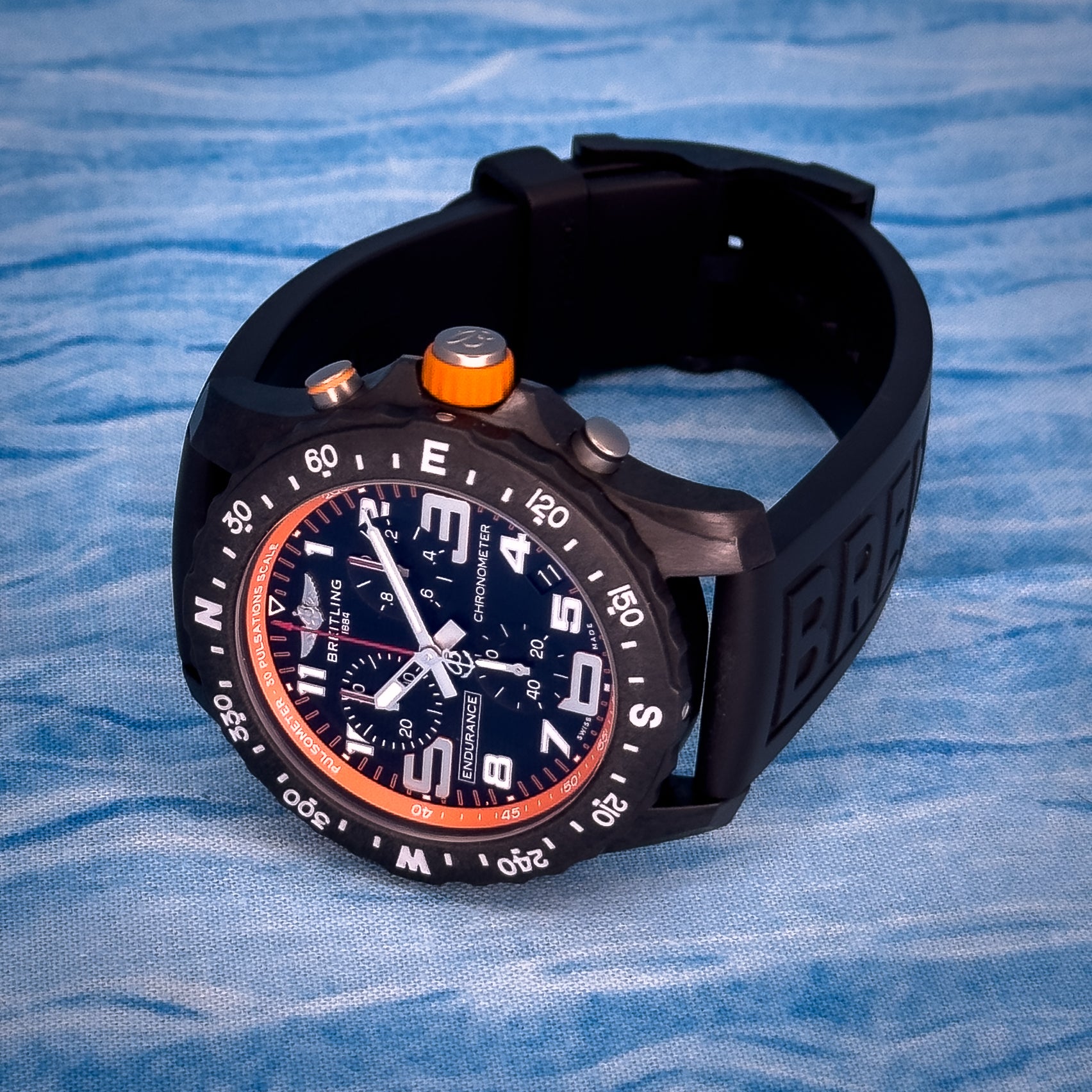 Breitling Endurance Pro Orange 44MM – Avelore Luxe